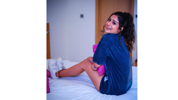 Payal Rajput Stunning Hot Look In Latest Blue Shirt On Bed