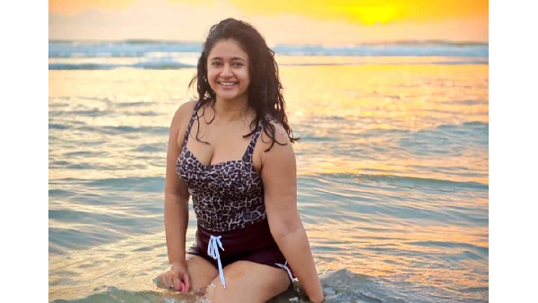Actress Poonam Bajwa Beach Photos Viral In Internet