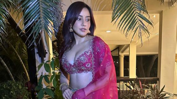 Chirutha Movie heroine Neha Sharma Stunning Bikini Look Photos Goes Viral 