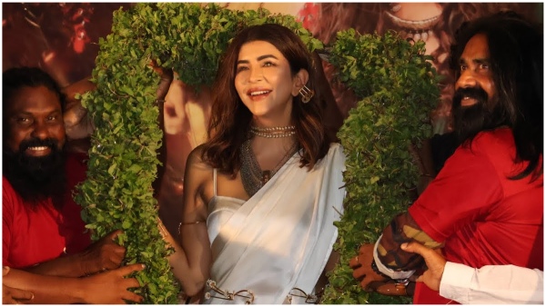 Fan bows to the feet of Manchu Lakshmi At Adiparvam Movie Event