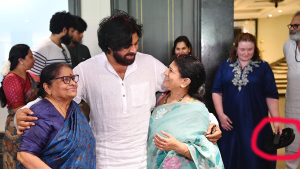 Pawan Kalyan Wife Anna Lezhneva carried Sandals while mega Celebrations at Chiranjeevi house