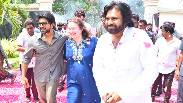 Pawan Kalyan Wife Anna Lezhneva carried Sandals while mega Celebrations at Chiranjeevi house