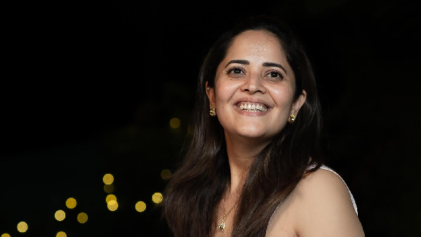 netizens vulgar comments on anasuya bharadwaj over her new year PhotoShoot