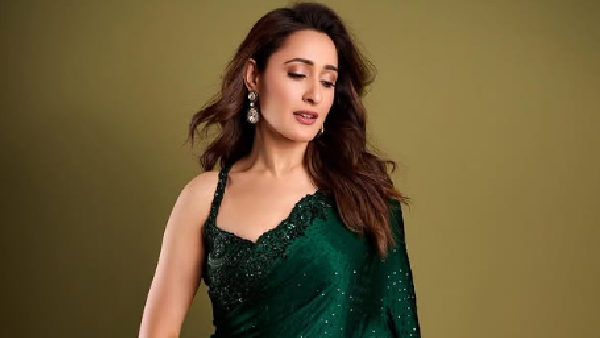 daaku maharaaj Fame Pragya Jaiswal PhotoShoot With red color lehenga Her latest photos here