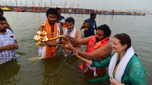 Andhra Deputy CM Pawan Kalyan take holy dip with Akira Nandan Trivikram at Prayagraj of Maha Kumbh Mela 2025