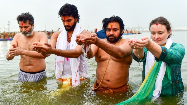 Andhra Deputy CM Pawan Kalyan take holy dip with Akira Nandan Trivikram at Prayagraj of Maha Kumbh Mela 2025