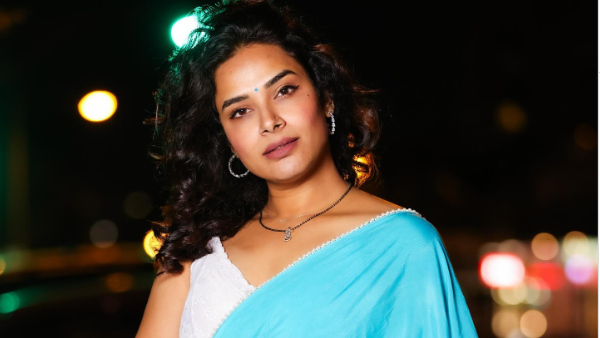 Bigg Boss Fame Hari Teja shares her latest photo shoot with blue saree