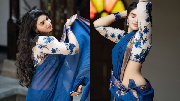 Anchor Varsha Viral Glam Photos Jabardasth Beauty Stuns in Blue Saree Look