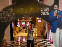 Excited Theatre Audience Pose Next To Bhooth Bangla Posters And Standees, The Reaction Is Next Level