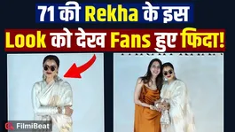 Rekha's simplicity wins fans' hearts once again, posing in a unique way for the paps! FilmiBeat
