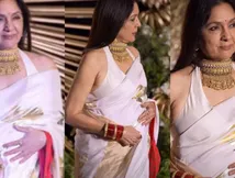 सफेद साड़ी में 66 साल की नीना गुप्ता की तस्वीरें हुईं वायरल, फोटो जूम करके लोग बोले- 'आने वाली है गुड न्यूज?'