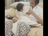  బేబీ సిట్టర్ గా ...పాలు పట్టిస్తూ మోహన్ బాబు (ఫొటో)  